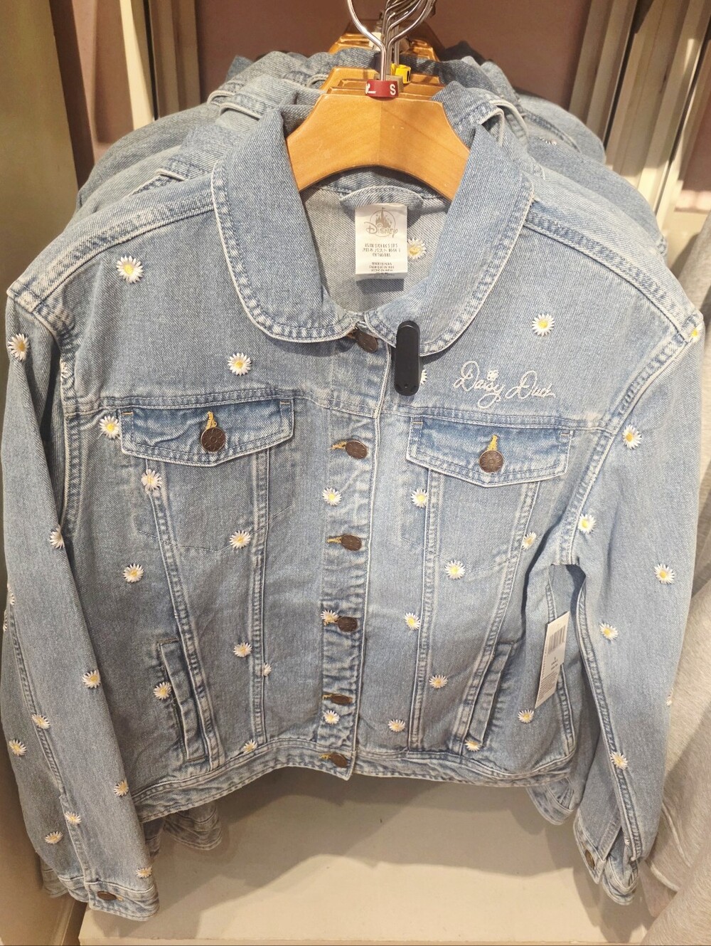 Disney Denim Jacket features an embroidered Daisy Duck back patch with scattered - Picture 2 of 2